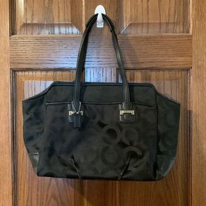 A beautiful black Coach purse